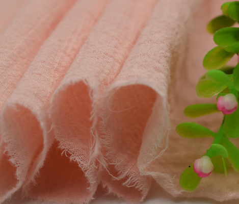 Περιβαλλοντικό Muslin 110GSM γενικό ύφασμα γάζας υφάσματος πορτοκαλί